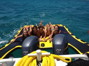 Girls love inflatable boat sleds