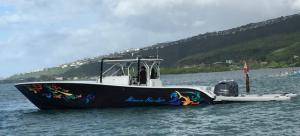 Inflatable boat sled behind a speedboat