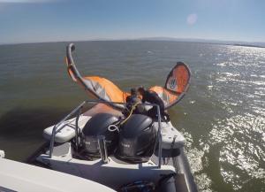 Inflatable boat sled adding space to a small boat