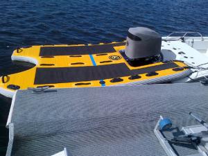 Single outboard with inflatable boat sled